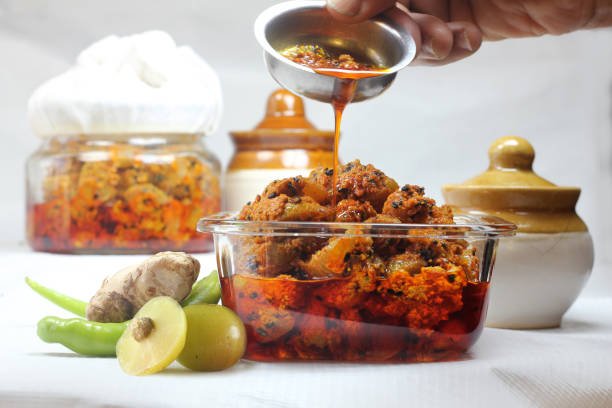 Indian gooseberry pickle or Aavla pickle or Awle ka aachar made with chilly,ginger and oil during winter season.