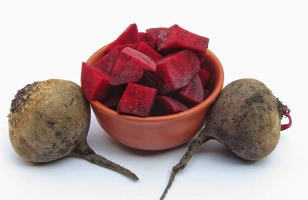 Beetroot sliced in a bowl isolated on white background