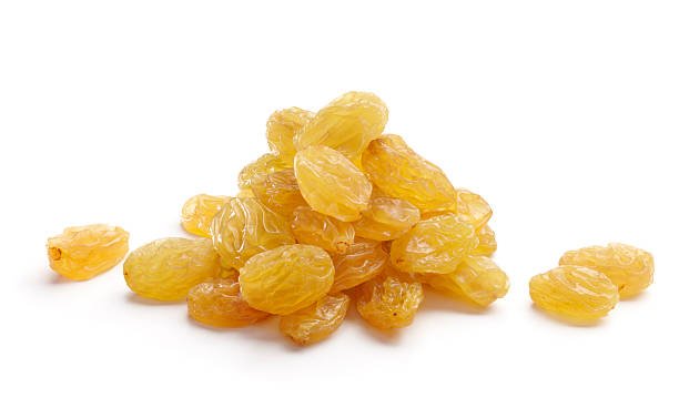 heap of raisins isolated on white background